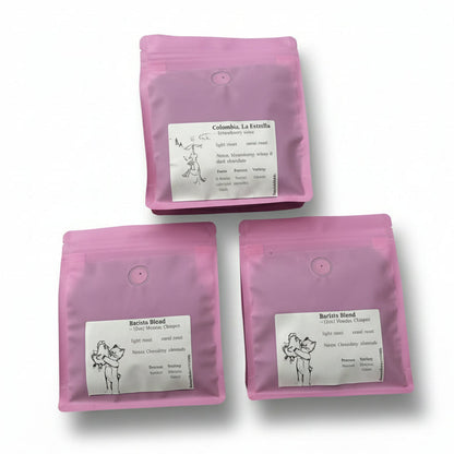 Three pink packages with labels on a white background, coffee deal